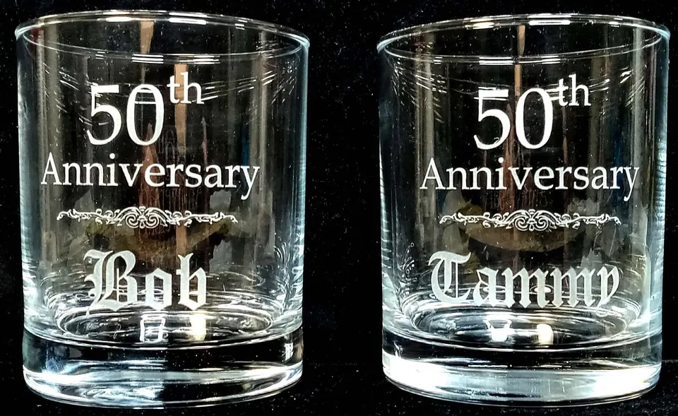 Two rocks glasses engraved for a 50th anniversary