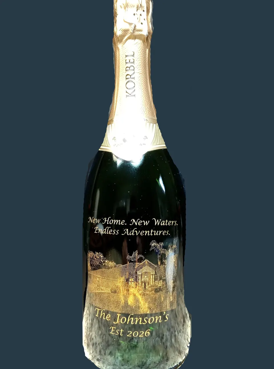 Champagne bottle engraved to celebrate a new home