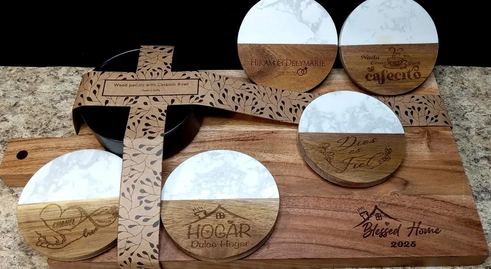Marble and wood coasters and a board with engraved designs