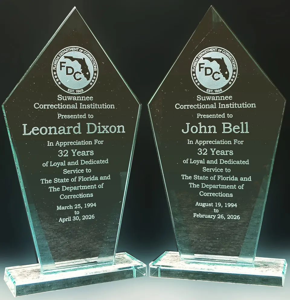 Two glass years-of-service awards