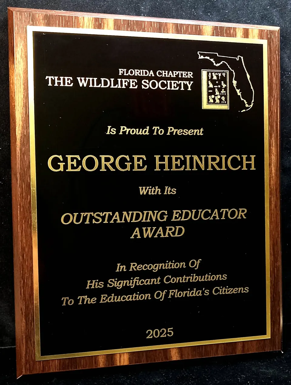 Outstanding Educator Award plaque in walnut and black