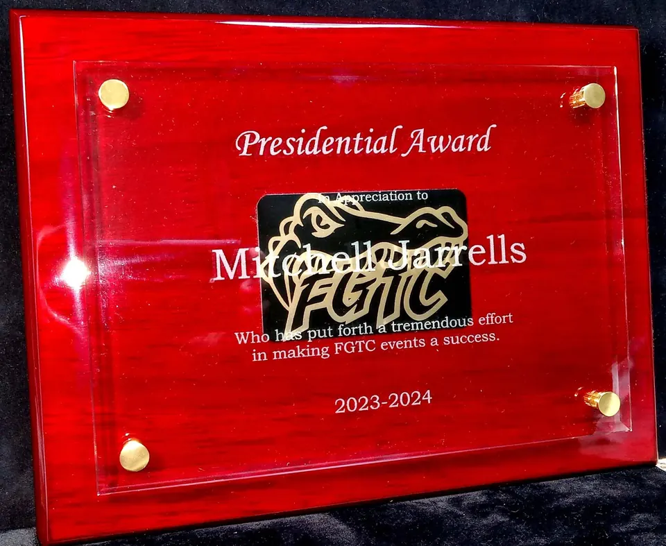 Red Presidential Award plaque with an acrylic overlay